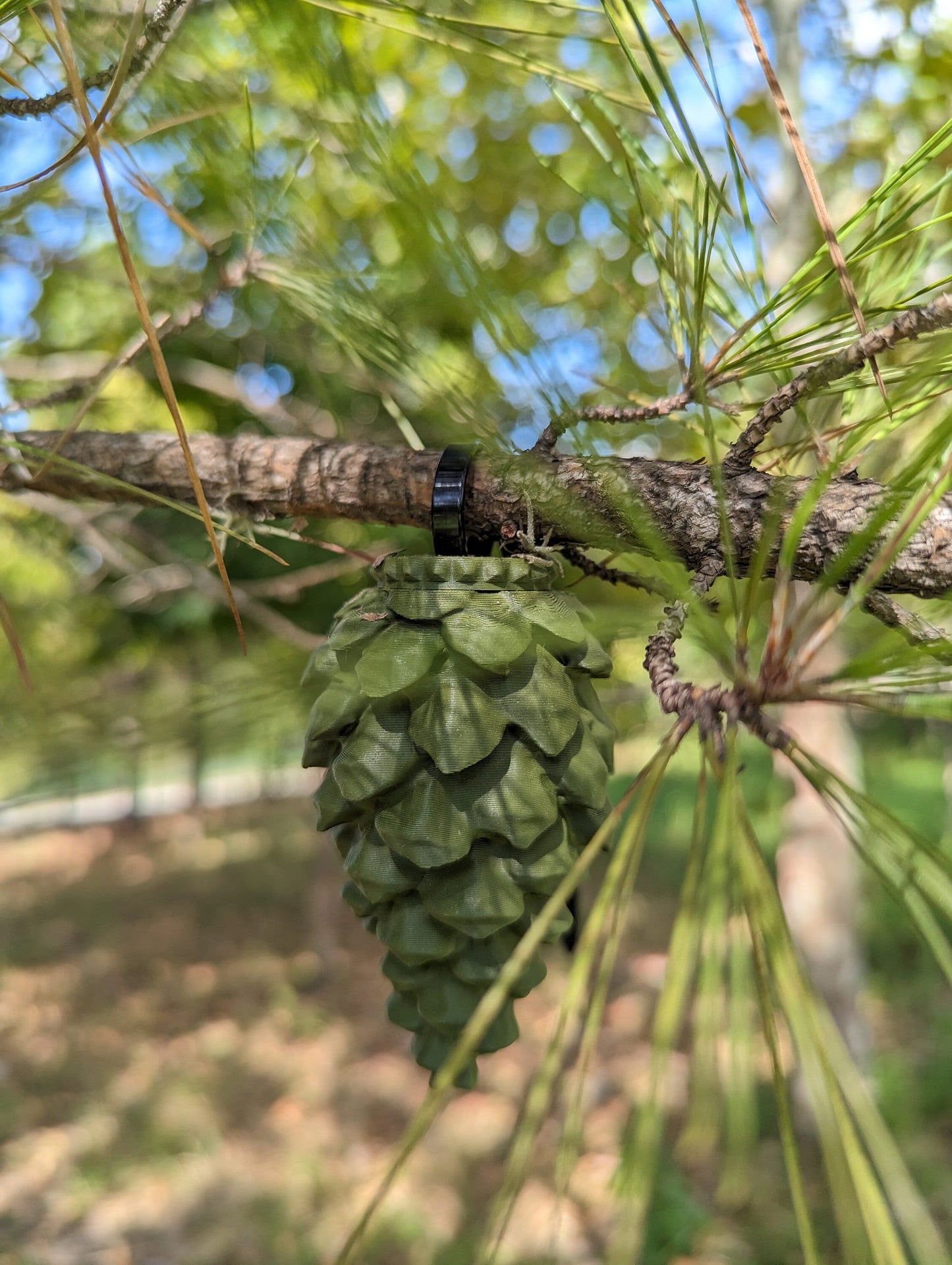 Pine cone 3d printed geocache with log and zip-tie - ready to be hidden!